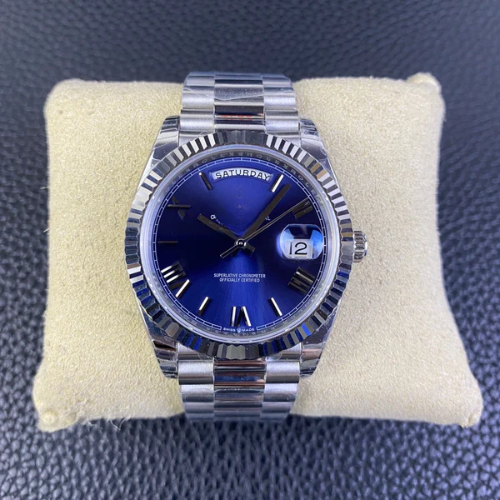 RLX Day-Date 40 in 18k white gold with a blue dial and fluted bezel